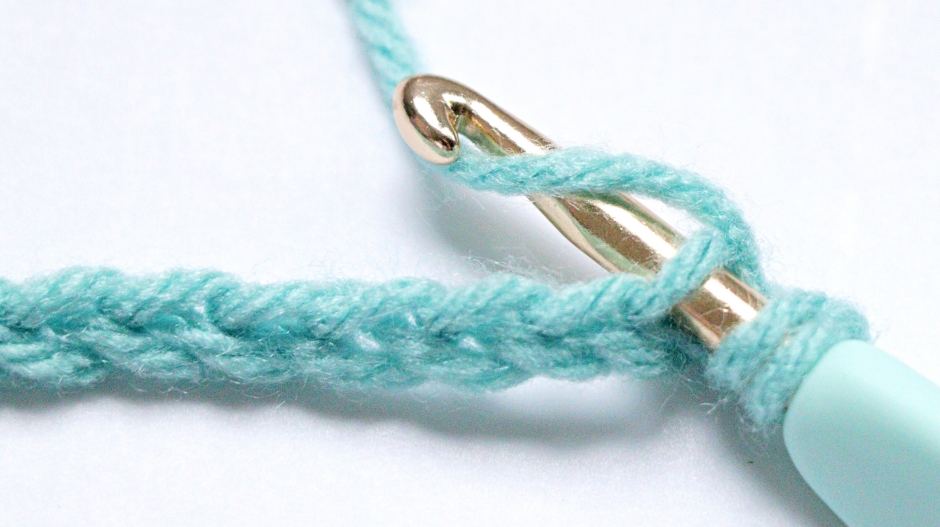 Half Double Crochet - yarn over and pull through a loop