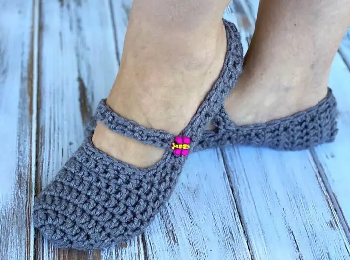 feet wearing crochet Chunky Button Slippers